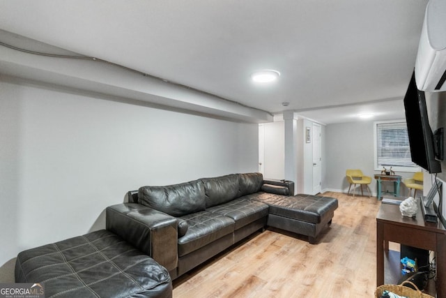 living room with light hardwood / wood-style flooring