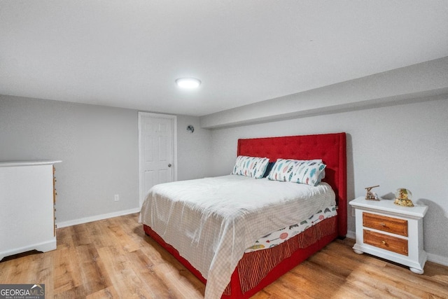 bedroom featuring hardwood / wood-style floors