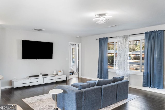 living room with dark wood-type flooring