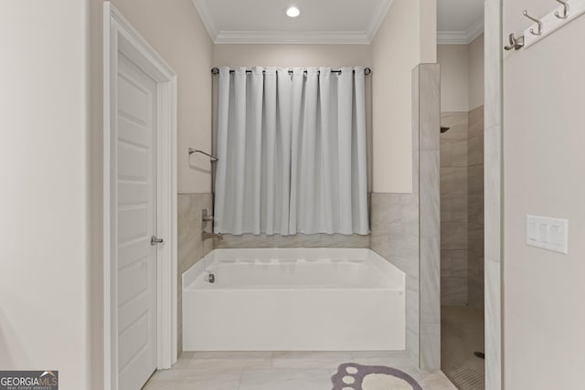 bathroom with crown molding and shower with separate bathtub