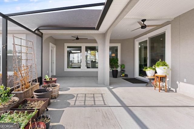 view of patio / terrace featuring ceiling fan