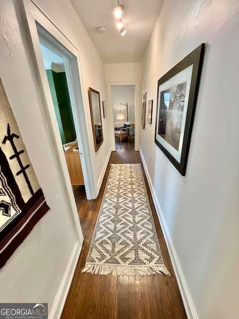 hall featuring dark hardwood / wood-style floors