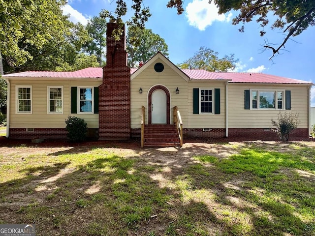 single story home with a front lawn