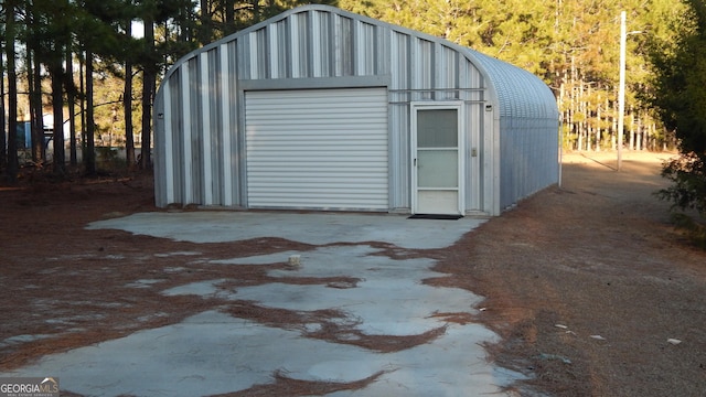 view of outbuilding with a garage