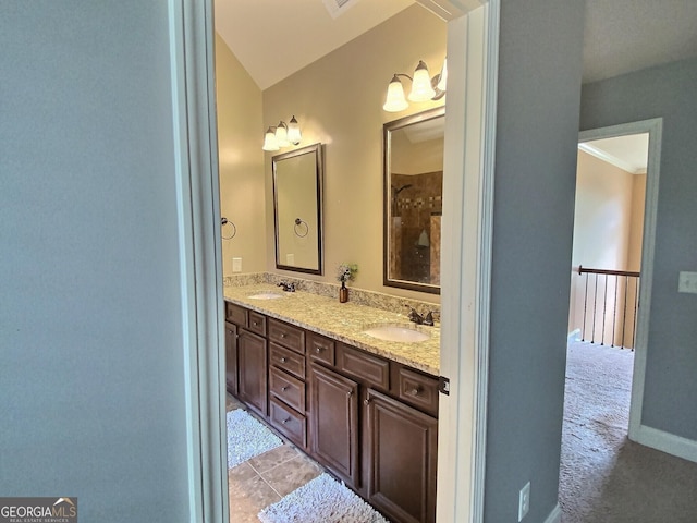 bathroom featuring vanity and tile patterned flooring