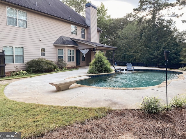 view of pool featuring a patio area