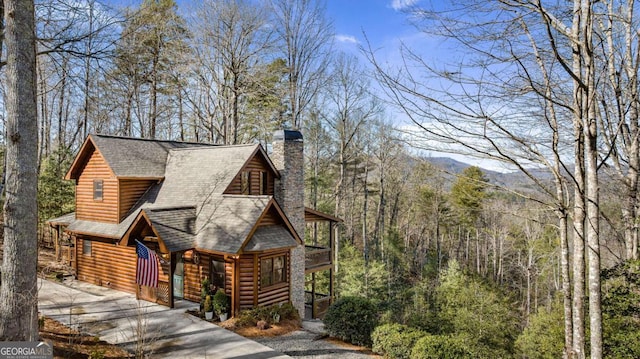 log home with a mountain view