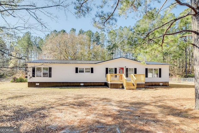 manufactured / mobile home featuring a deck