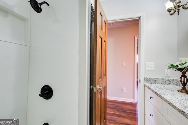 bathroom with vanity and hardwood / wood-style floors