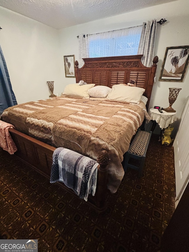 bedroom with a textured ceiling