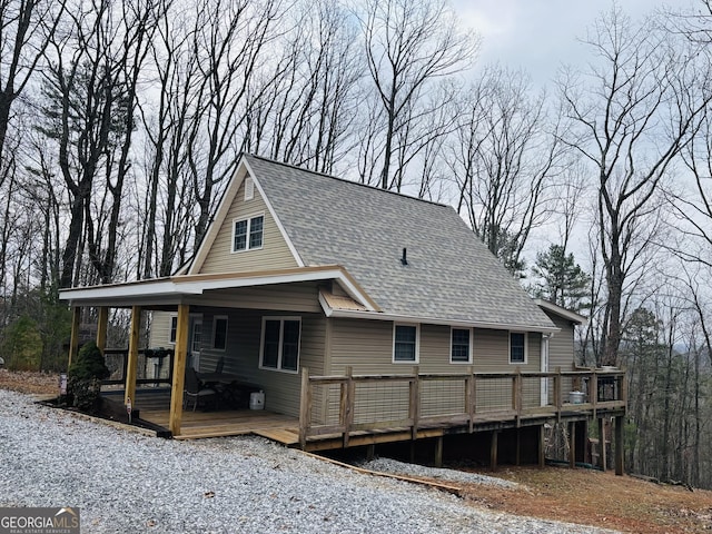 back of property with a deck