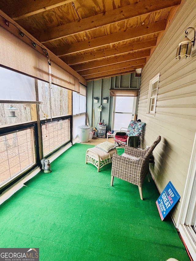 sunroom / solarium with wood ceiling and beam ceiling