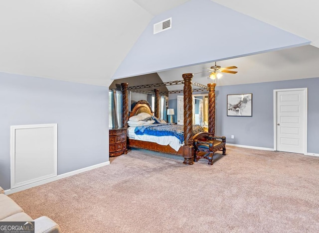 carpeted bedroom with ceiling fan and lofted ceiling