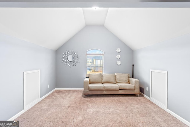 unfurnished room featuring vaulted ceiling and light colored carpet