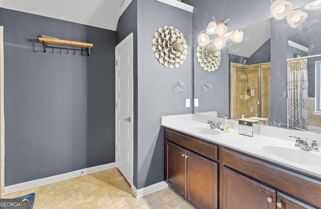 bathroom featuring walk in shower, vanity, and vaulted ceiling