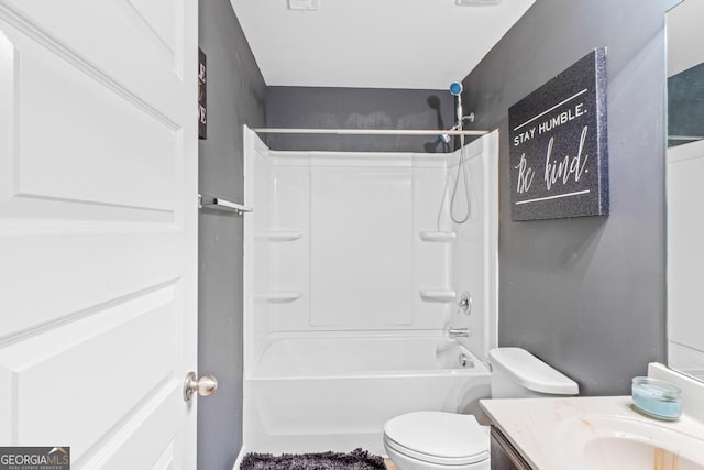 full bathroom with vanity,  shower combination, and toilet