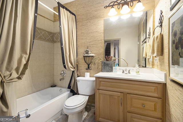 full bathroom with shower / tub combo with curtain, vanity, and toilet