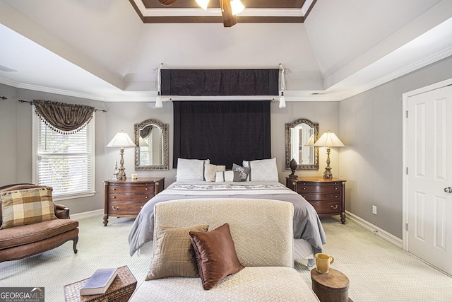 bedroom featuring light carpet, vaulted ceiling, ornamental molding, and a raised ceiling