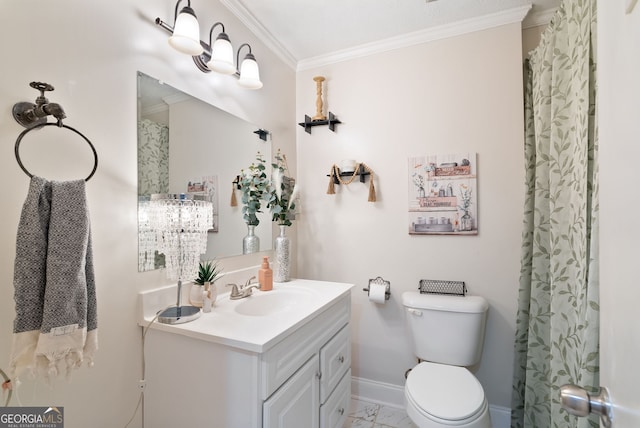 bathroom featuring vanity, ornamental molding, and toilet