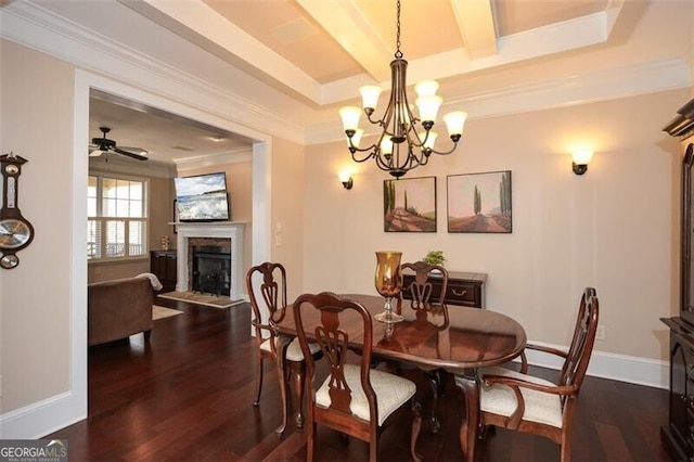 dining room featuring beam ceiling, ornamental molding, dark hardwood / wood-style flooring, and a tray ceiling