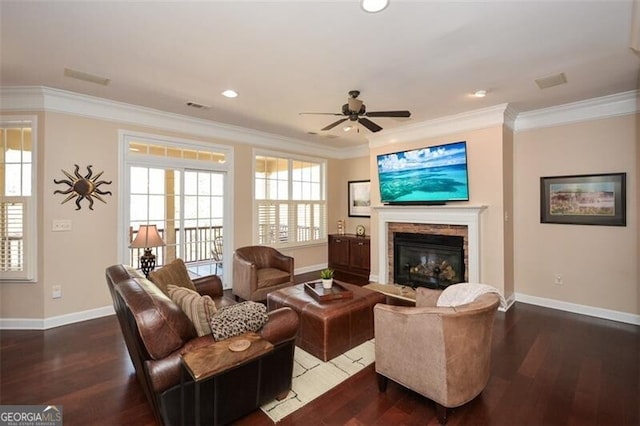 living room featuring ornamental molding, ceiling fan, and dark hardwood / wood-style flooring