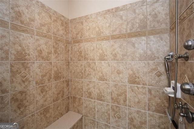 details with a tile shower