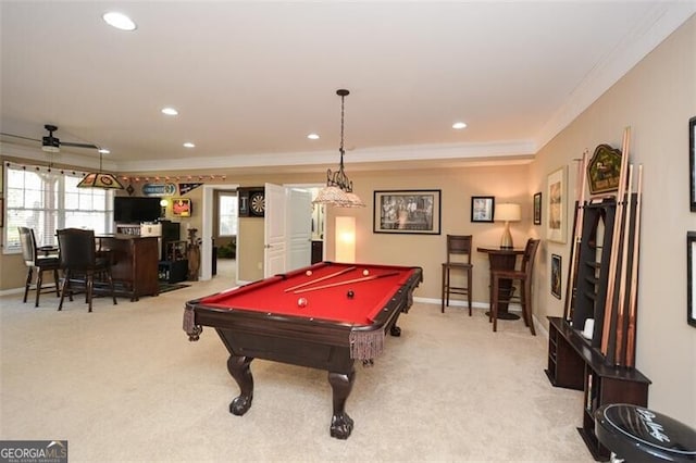 rec room featuring billiards, ornamental molding, ceiling fan, and carpet