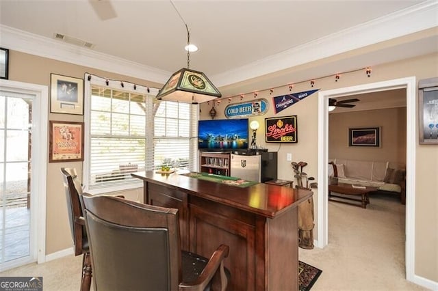 bar featuring ornamental molding, light carpet, and ceiling fan