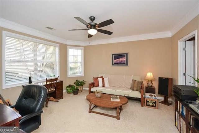 office area with crown molding, ceiling fan, and carpet floors