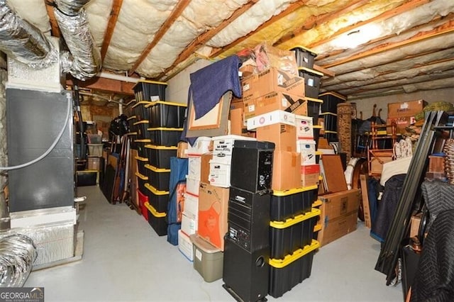 storage room featuring heating unit