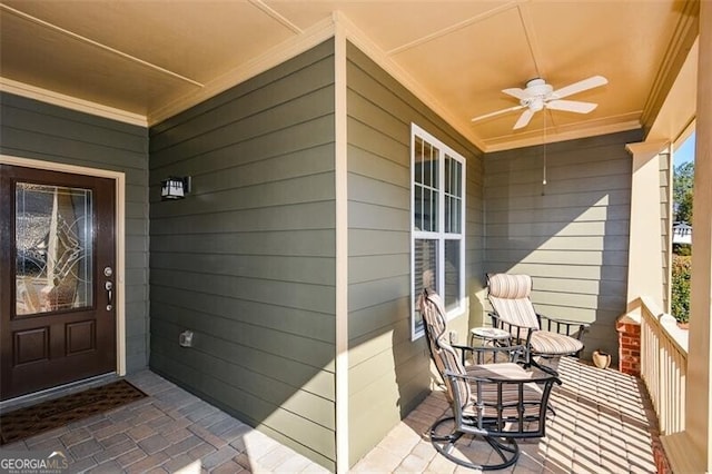 property entrance with covered porch and ceiling fan