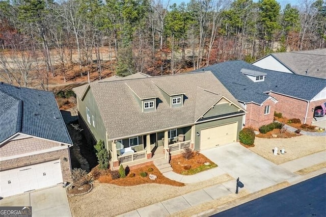 view of front of home featuring a garage and covered porch