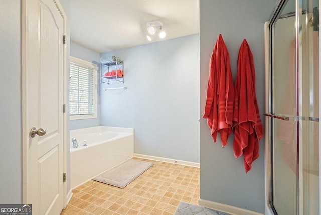 bathroom featuring plus walk in shower