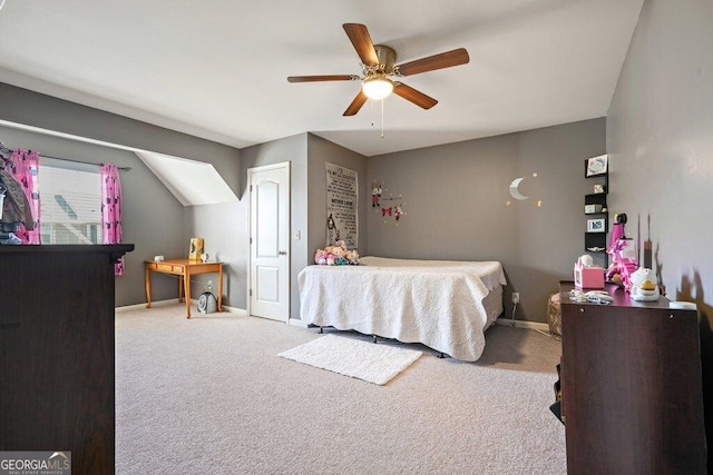 bedroom with ceiling fan and carpet