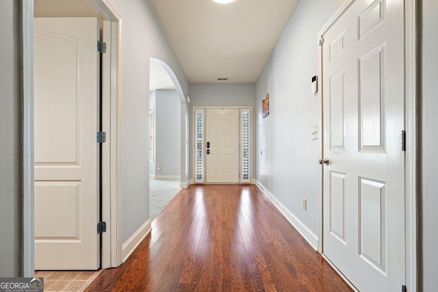 interior space with hardwood / wood-style flooring