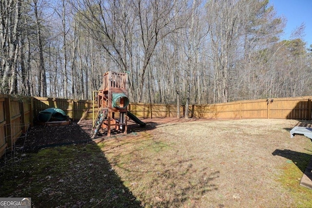 view of yard with a playground