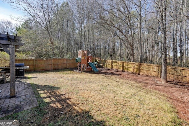 view of yard featuring a playground