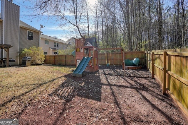 view of play area with a yard