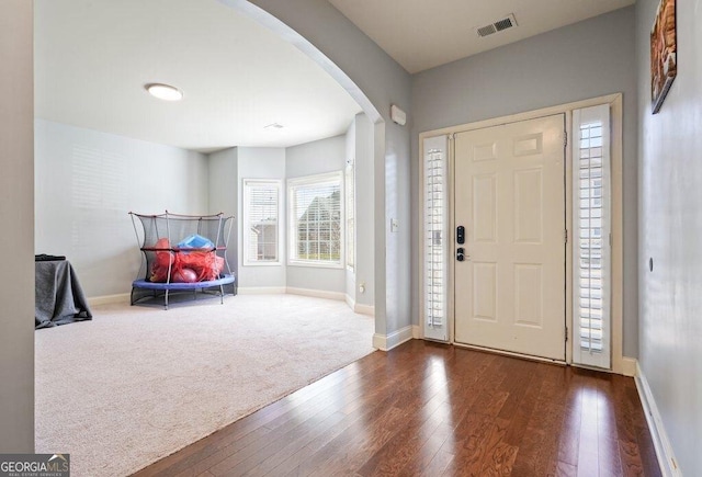 entryway featuring dark wood-type flooring