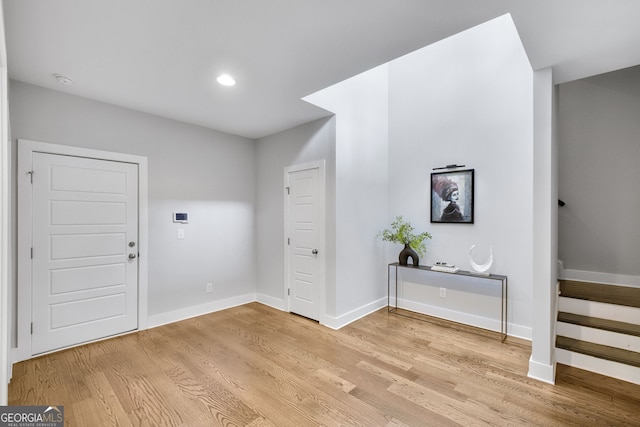 foyer with light hardwood / wood-style floors