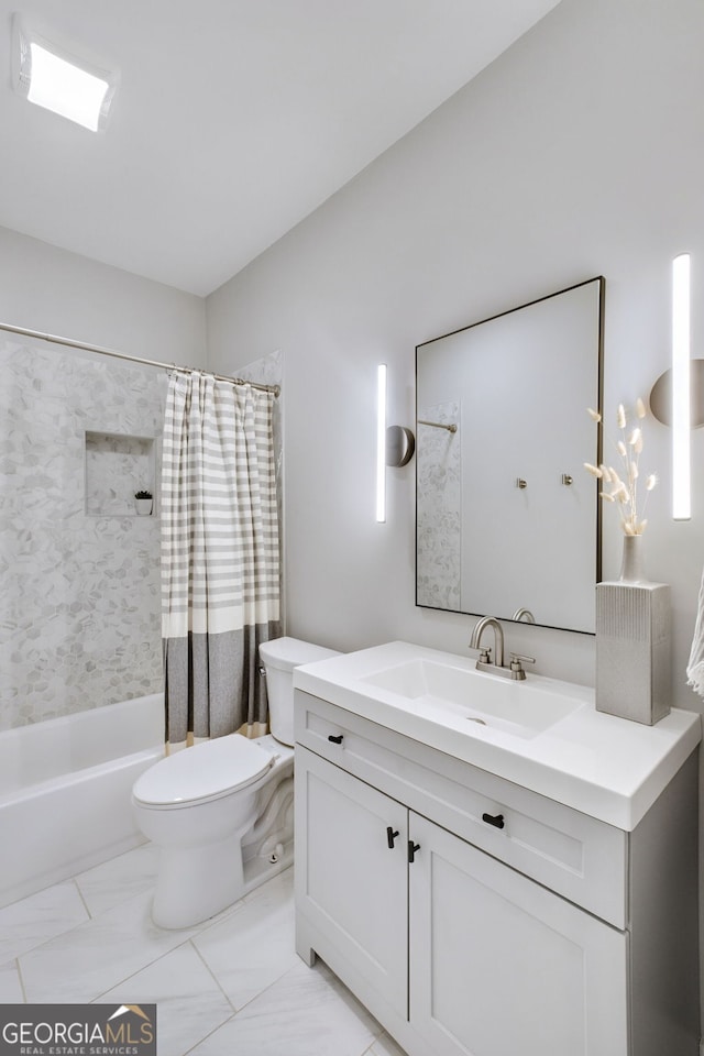 full bathroom featuring vanity, shower / bath combination with curtain, and toilet