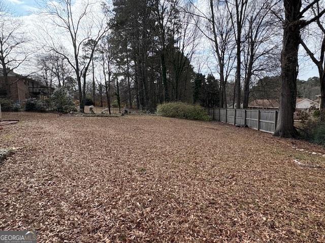 view of yard featuring fence