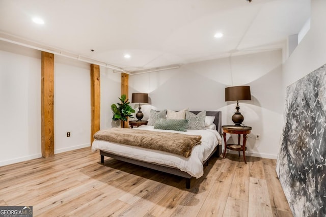 bedroom with light wood-type flooring