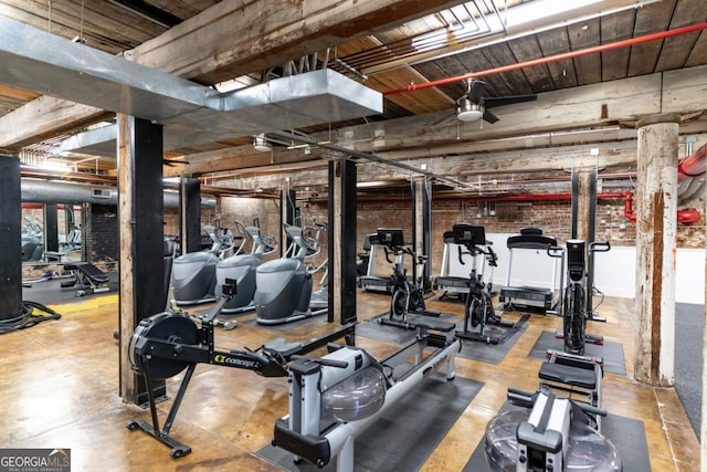 workout area with brick wall