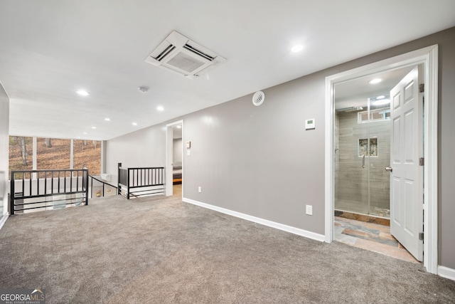 spare room featuring carpet flooring