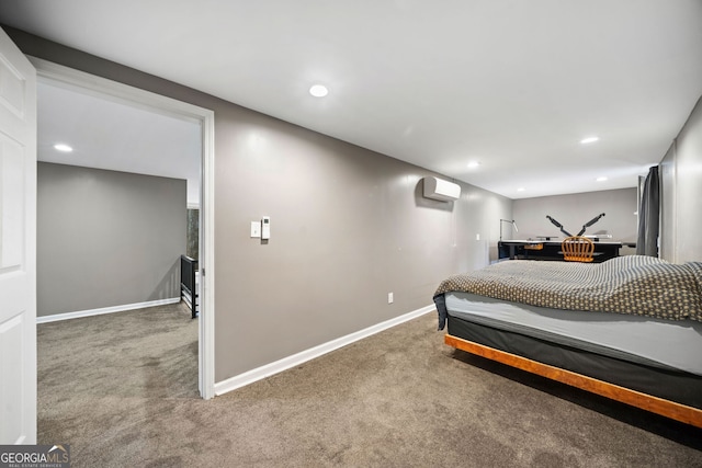 bedroom with carpet floors and an AC wall unit