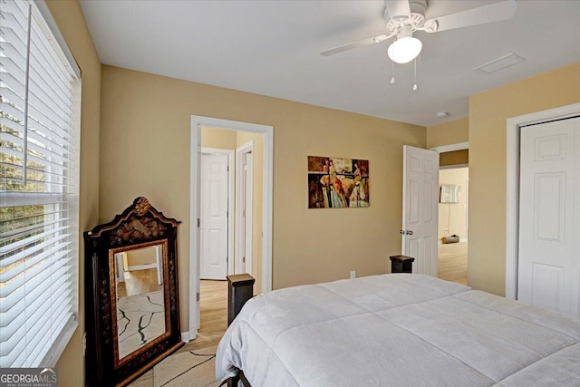 bedroom featuring light wood-type flooring and ceiling fan