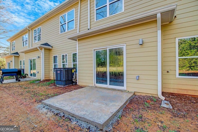 back of property with a patio area