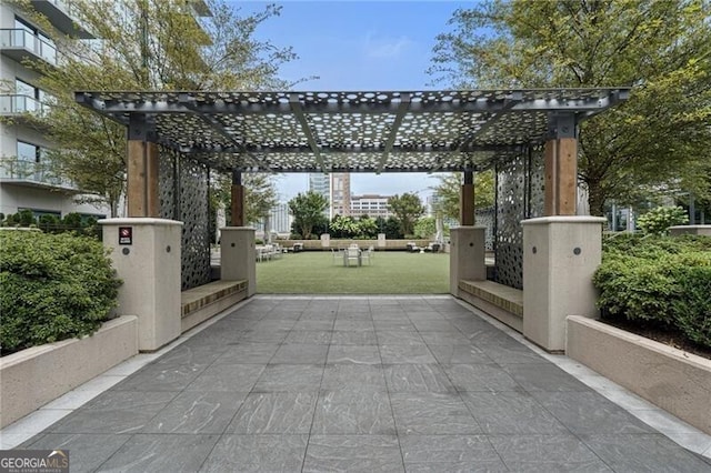 view of patio featuring a pergola