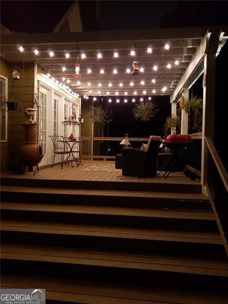 deck featuring french doors and an outdoor hangout area